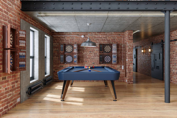 istock Industrial Style Game Room With Billiard Table, Dartboards, Pendant Light And Brick Wall 2193975530