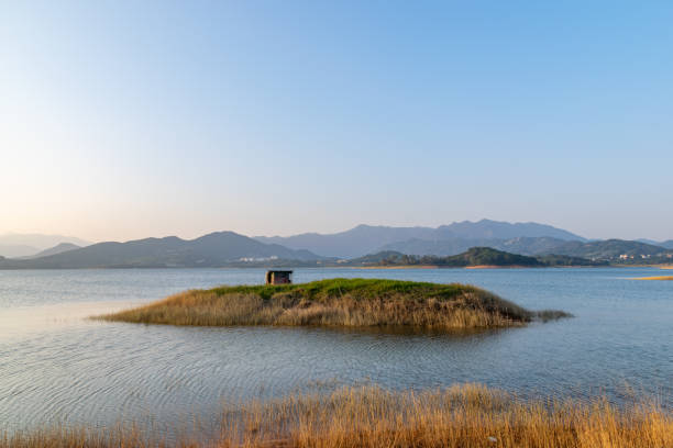 Mountains and islands by the lake on a sunny day