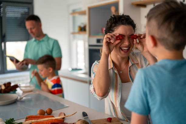 istock Joyful Modern Family Creating Memories While Cooking Fresh Ingredients Together 2193979064