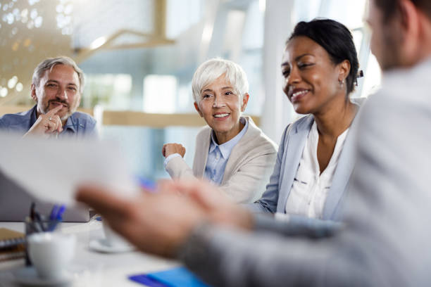 istock Happy entrepreneurs having a constructive meeting in the office. 2193983417