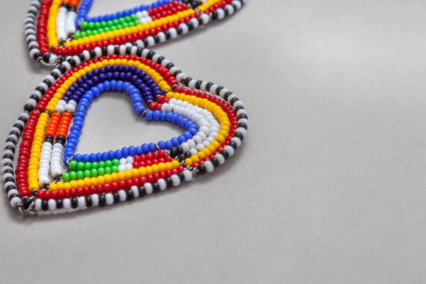 istock A pair of colorful beads that form a heart shape 2193983922