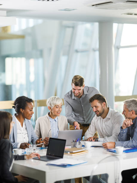 istock Happy entrepreneurs working on a meeting in the office. 2193984186