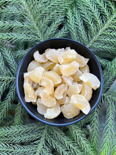 istock Gooseberry candy in bowl isolated on a tree leaf background 2193987337
