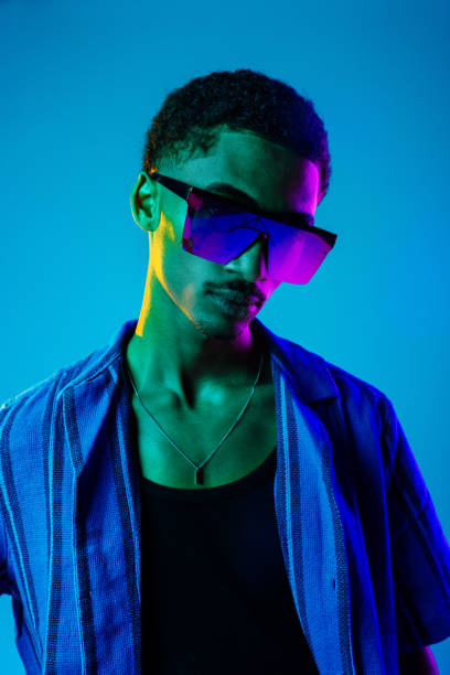istock African man portrait in studio on colorful background 2193987521
