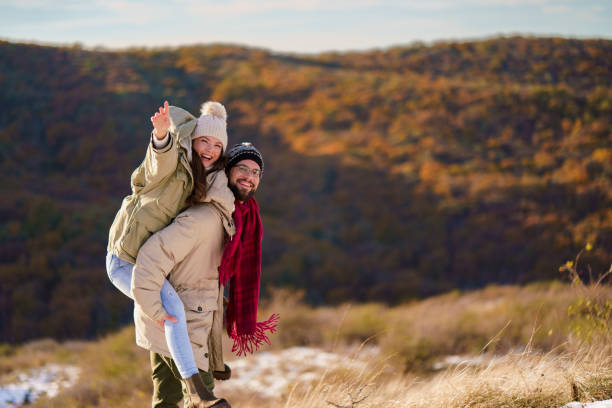 istock Carefree couple enjoying on a mountain 2193987872
