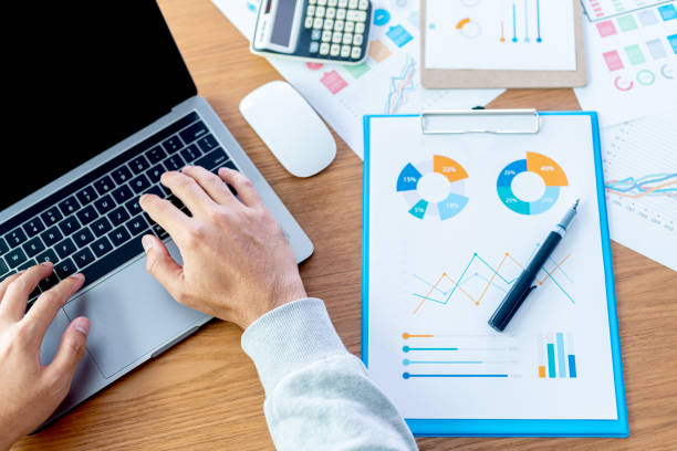 istock Work space at home, financial data graphs, Financial analysis or business evaluation concept 2193990536