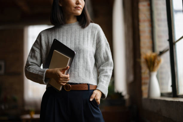 istock Unrecognizable female entrepreneur in the office. 2193991230