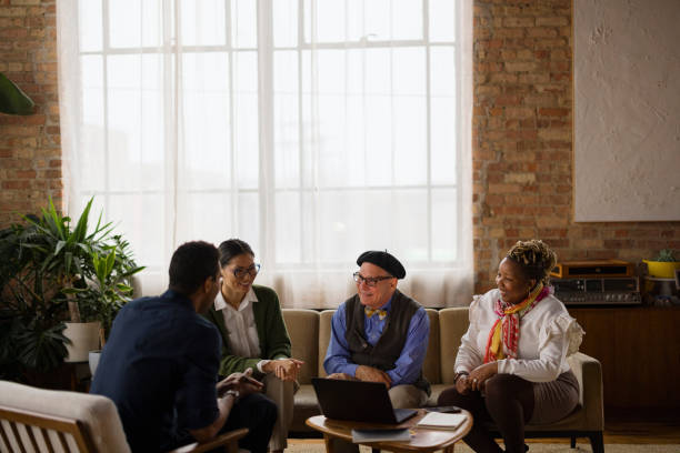 istock Happy business team talking on a meeting at casual office. 2193992871