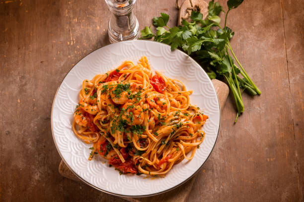 istock linguine with shrimp tomato sauce and parsley 2193993304