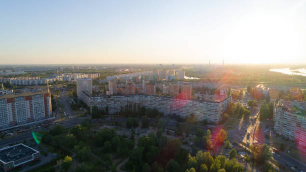 istock City skyline with a bright sun shining on it 2193996701