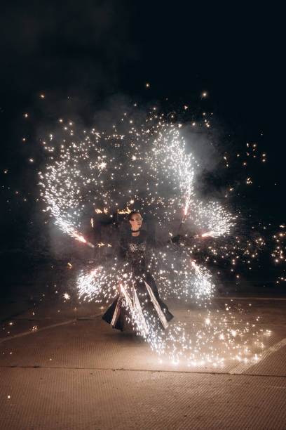 istock fireshow artist woman 2193996859