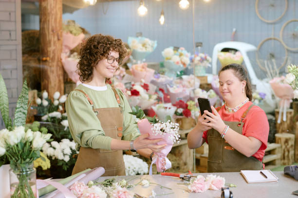 istock Coworker Developing Social Network of Flower Shop 2193999455