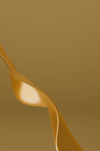 istock Abstract 3D rendering of dynamic golden ribbon shape on a soft textured background 2193999632