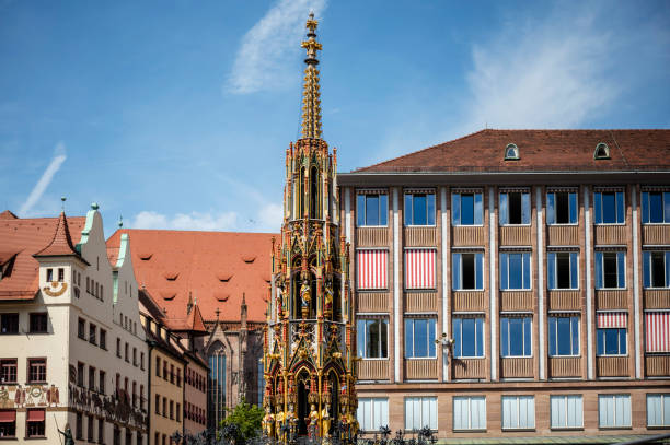 The “Schöner Brunnen” on the market square in the historic old town of Nuremberg.
