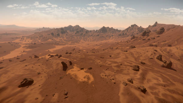 istock Vast red dunes and rocky formations stretch across the Martian surface, revealing a rugged terrain. 3d render 2194003362