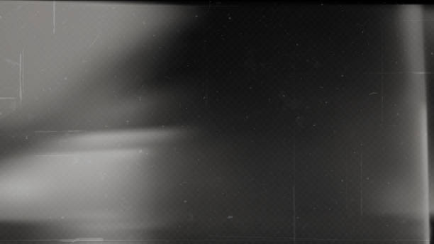 Old film texture with scratches, noise and light leaks. Realistic transparent overlay film texture in black-white, dust and grain. Distressed retro movie or photo negative effect of cinema nostalgia Old film texture with scratches, noise and light leaks. Realistic transparent overlay film texture in black-white, dust and grain. Distressed retro movie or photo negative effect of cinema nostalgia. film camera overlay stock illustrations
