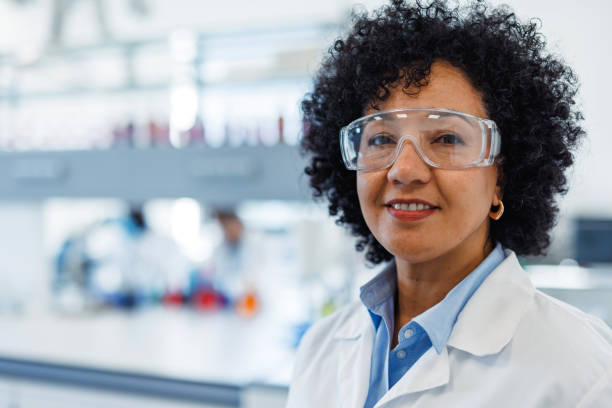 istock Portrait of a smiling scientist working in a laboratory 2194012924