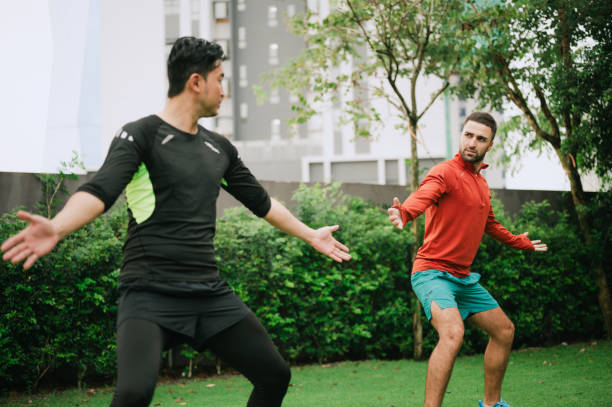 istock White people is learning Chinese exercise from his Asian coach 2194013355