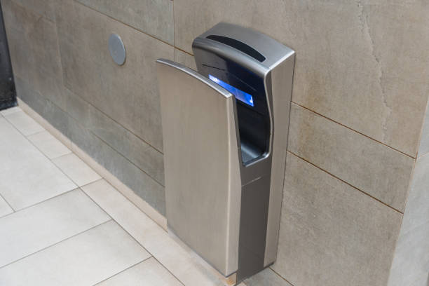 istock An automatic hand dryer installed in a contemporary bathroom setting promotes hygiene and efficiency for users after washing hands 2194013945