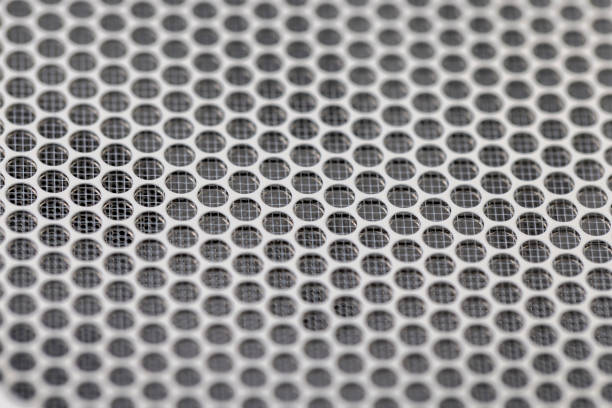 one plastic light grille with a large number of holes on the vent to protect the fans, close up