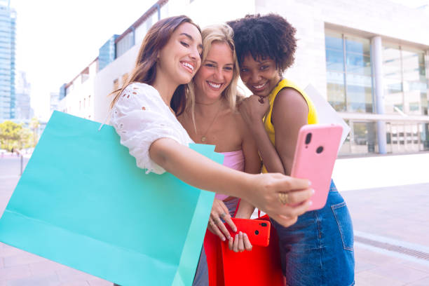 istock Happy friends taking a fun selfie outdoors 2194019023