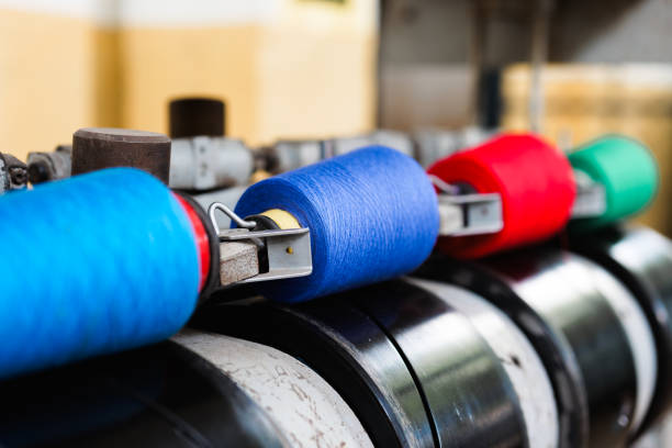 istock Vibrant Threads Displayed on Advanced and Innovative Textile Machinery and Equipment 2194020885