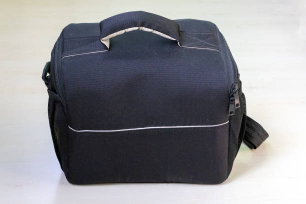 A black bag on a white background. This versatile bag is ideal for cameras, travel, notebooks, and everyday use.