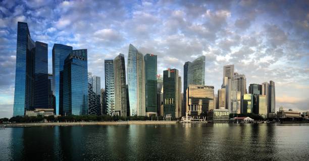 istock Singapore Downtown Core skyline reflected in Marina Bay during sunrise, February 2019 2194026104