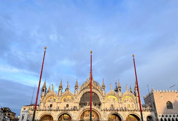 istock Saint mark's basilica illuminating under a cloudy sky in Piazza San Marco, Venice 2194026475