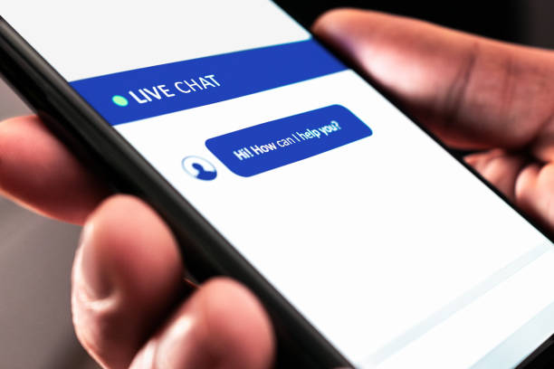 istock Live customer chat or chatbot service. Support bot for online help on website. Automated message in mobile phone. Assistant and communication app on cell screen. 2194031631