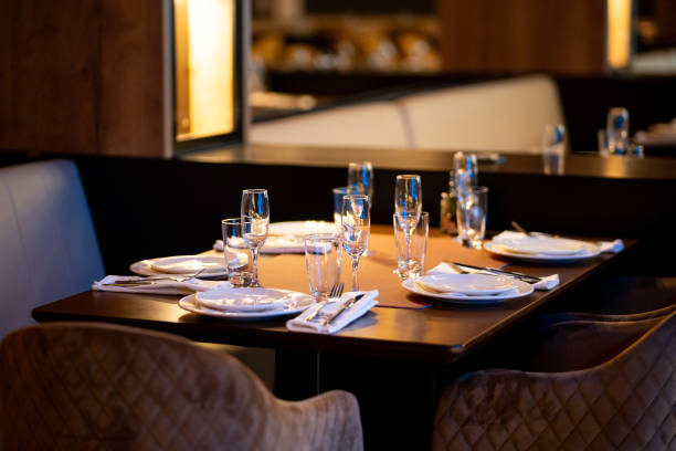 istock Elegant Restaurant Table Set with Fine Glassware and Silverware 2194032224
