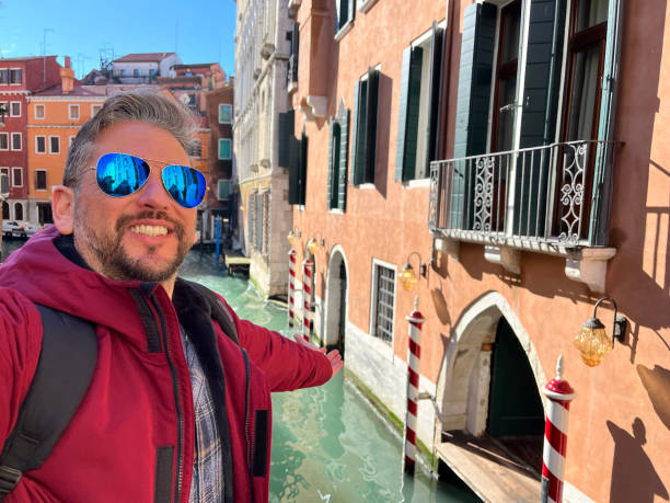 istock Tourist enjoying Venice canals during Carnival holidays 2194033280