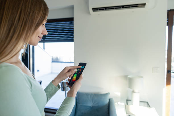 istock Controlling home air conditioning with smart phone 2194034471