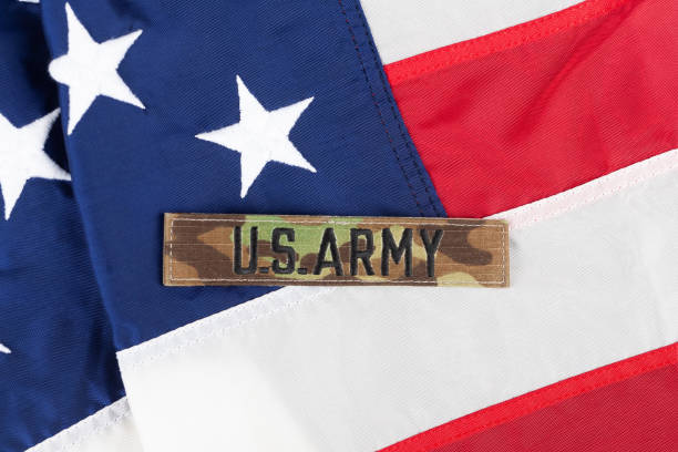 istock US ARMY Branch Tape on national USA flag 2194038436
