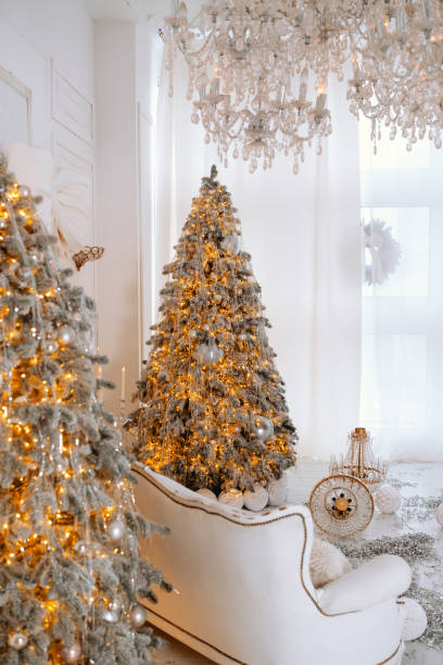 istock Cozy Christmas with a decorated tree and gifts in winter 2194040050