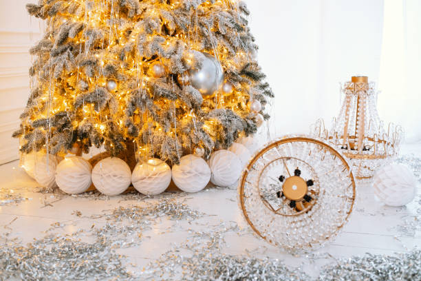 istock Festive winter setting with a beautifully decorated Christmas tree and gifts 2194040060