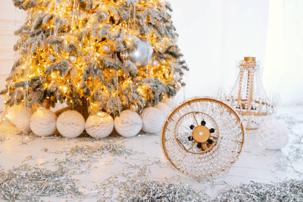 istock Holiday tree with gifts and winter decor for festive cheer 2194040094