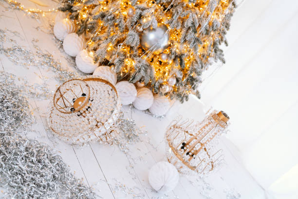 istock Joyful Christmas scene with shimmering decorations and a festive tree 2194040100