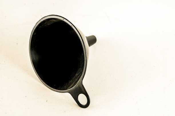 istock A black funnel is sitting on a white background 2194043316