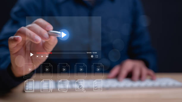 istock Person interacts with digital media player, highlighting increasingly digital landscape of content consumption and importance of seamless user experiences in multimedia applications 2194046155