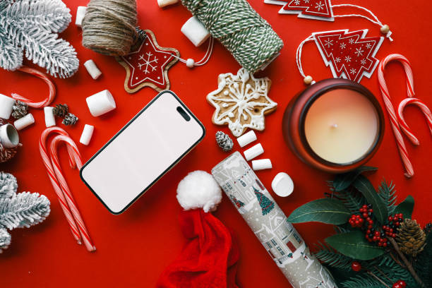 istock Phone with isolated screen against christmas decor background, online shopping 2194047901