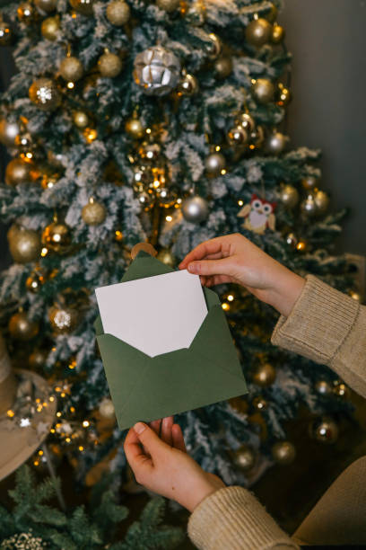 istock Girl holding letter with space for text, Christmas mood 2194048371