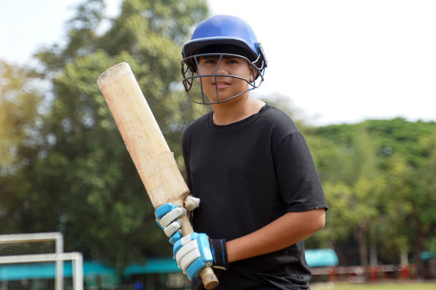 istock A cricketer holds the bat while waiting for the cricket ball. 2194049244
