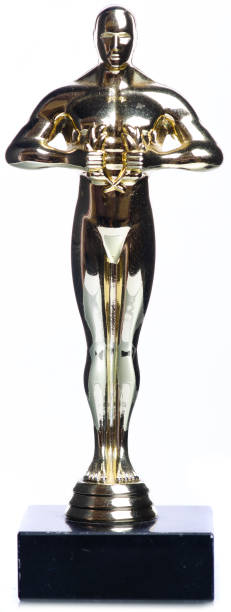 istock golden trophy man on white background 2194049623