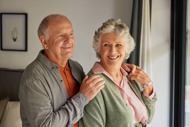 istock Happy senior couple at window 2194052055
