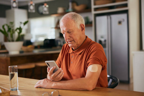 istock Diabetic senior man checking glucose on digital app 2194053992