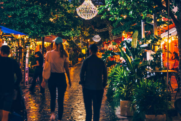 Miami Beach, USA - People walking in Lincoln Road shopping district,  full of stunning architecture, restaurants, culture and retail stores.