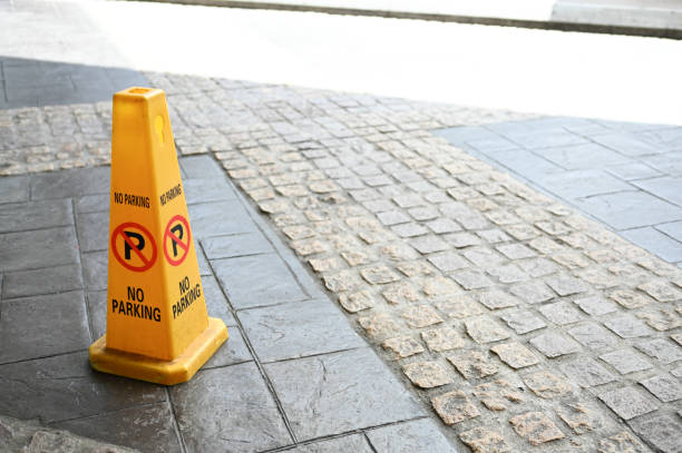 istock Clear Parking Restrictions with No Parking Cone 2194055048