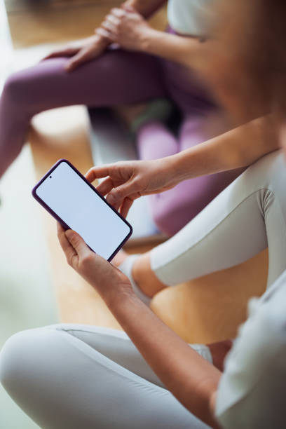 istock Group Chatting While Relaxing in Comfortable Casual Clothing at a Yoga Studio 2194056293