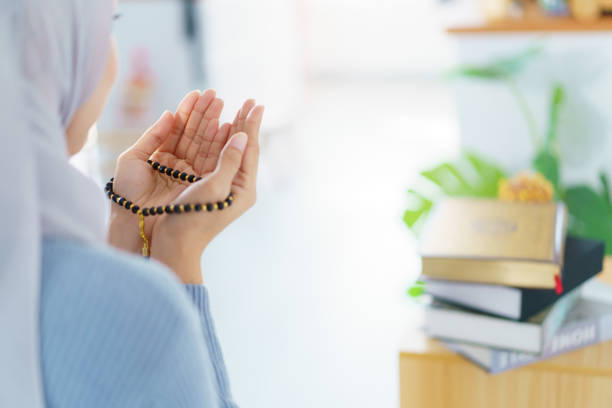 istock Asian muslim woman praying for Allah. 2194060340